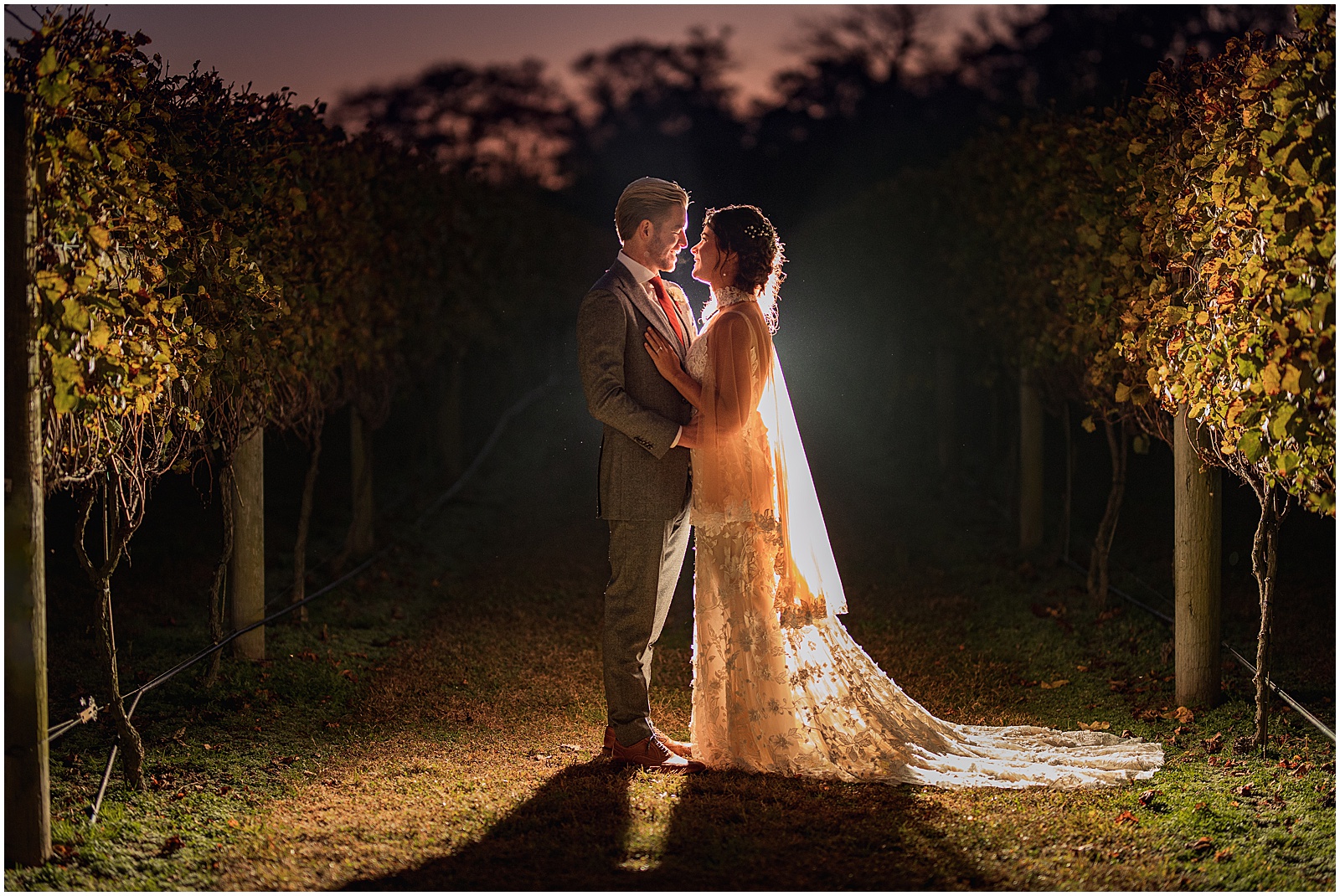 Sunset portrait of bride and groom at willow creek winery