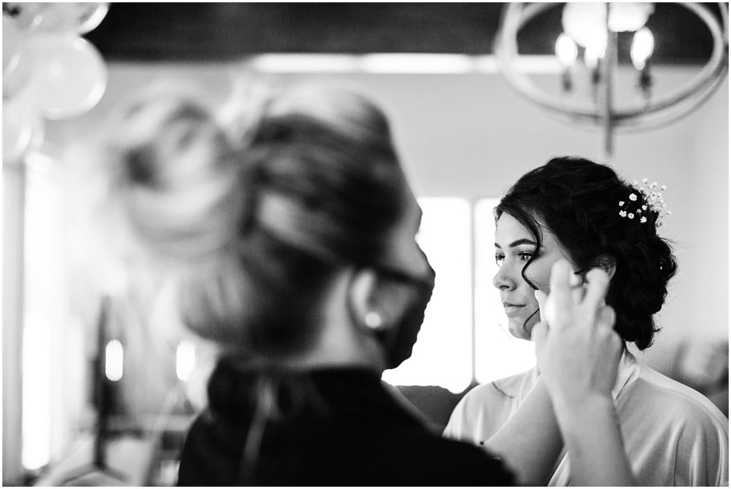 NJ Shore Wedding Bride Getting Ready. Bride getting her makeup done. Black and White Wedding Photography.