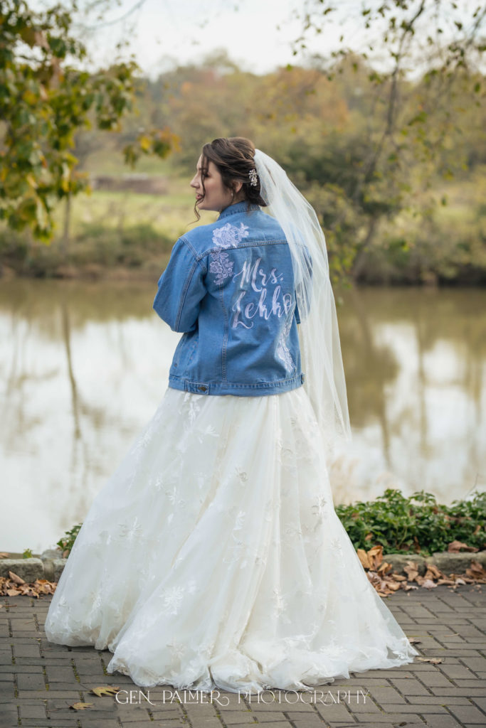 Estate at Eagle Lake Fall Wedding Photos Bride with Denim Jacket