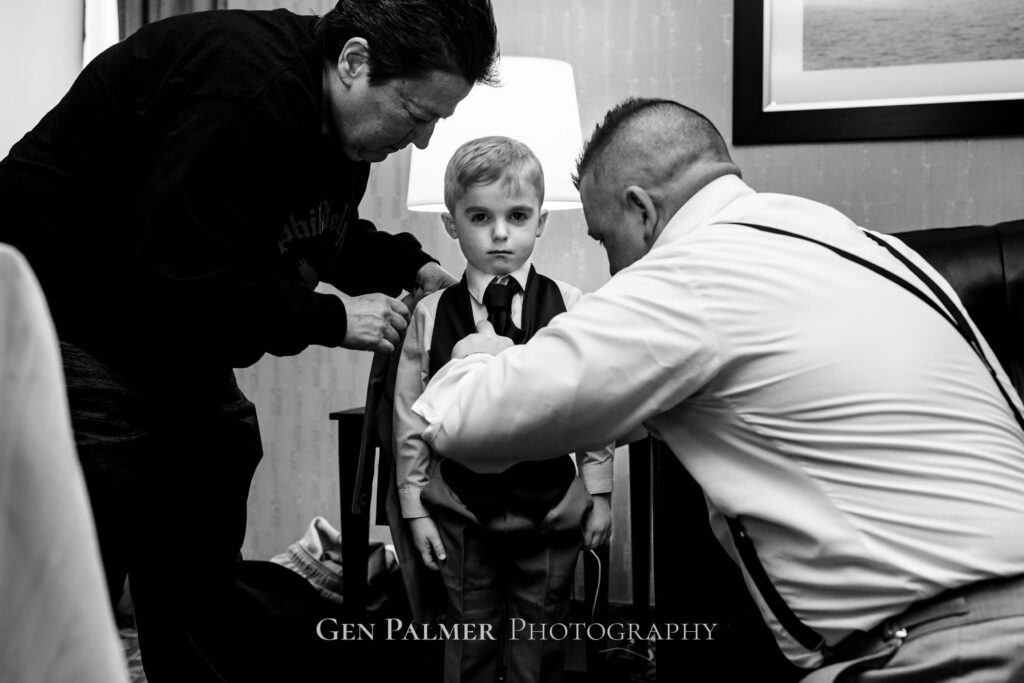 Ring bearer getting ready on wedding day