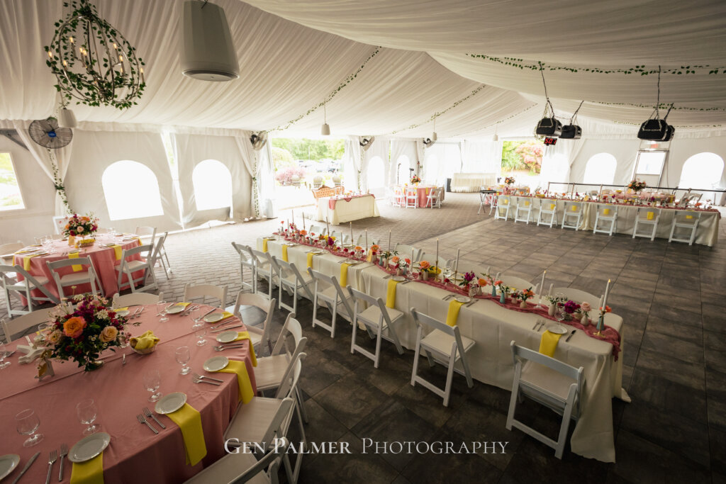 Summer Wedding at the Estate at Eagle Lake Reception with long tables and bright colors