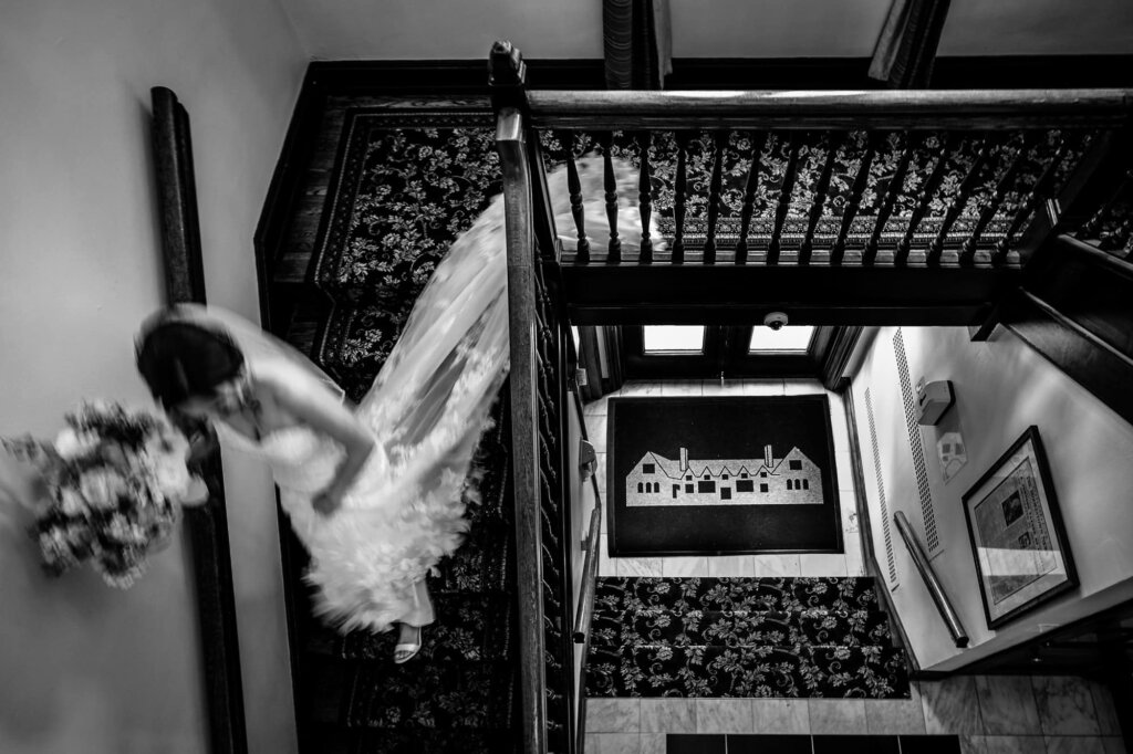 Community House of Moorestown Wedding Bride walking down the stairs