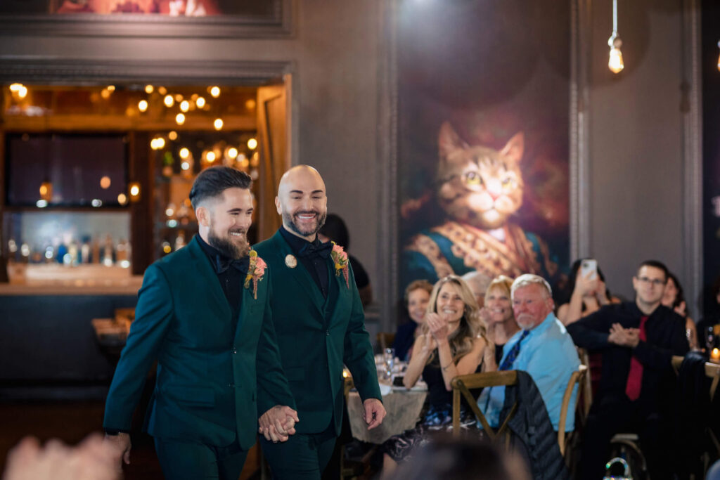 LGBTQ+ Wedding couple walking down the Aisle at Porta Asbury Park