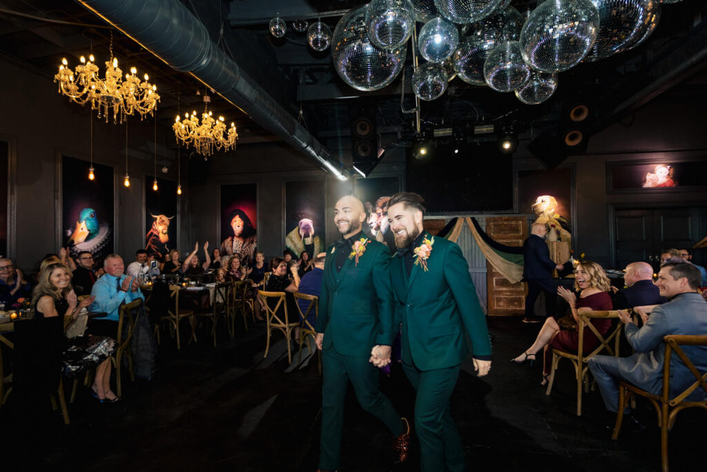 LGBTQ+ Wedding Couple walking post-marrage in Porta Asbury Park