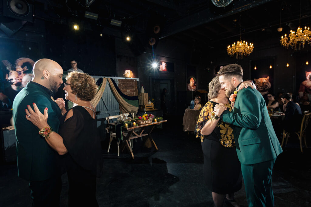 LGBTQ+ Grooms dancing with mothers at wedding in Porta Asbury Park