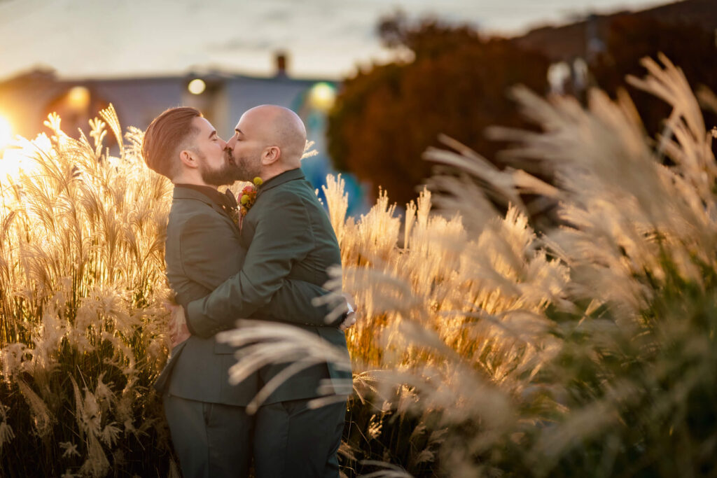 LGBTQ+ Wedding couple kissing in Porta Asbury Park