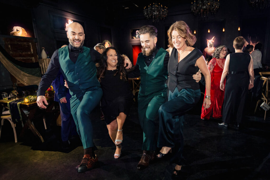 Grooms dancing the can-can with relatives at Porta Asbury Park