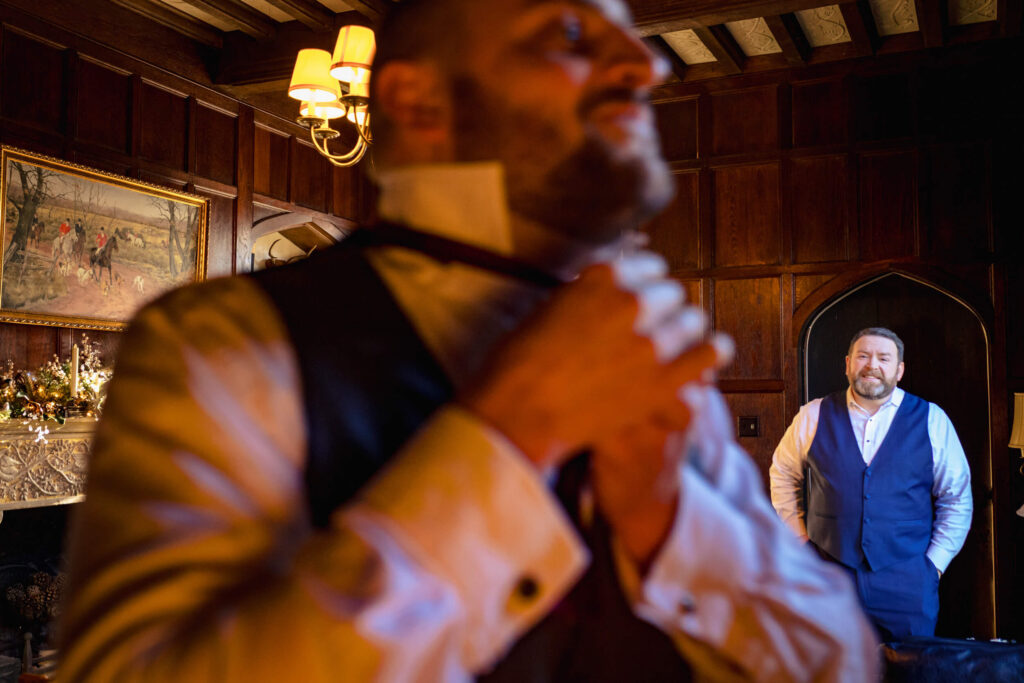 LGBTQ+ Couple getting ready for wedding at Aldie Mansion