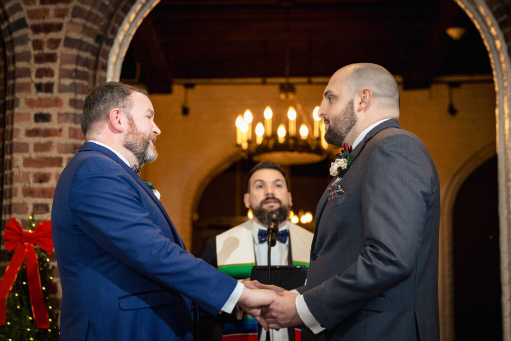 LGBTQ+ Couple getting officiated at Aldie Mansion