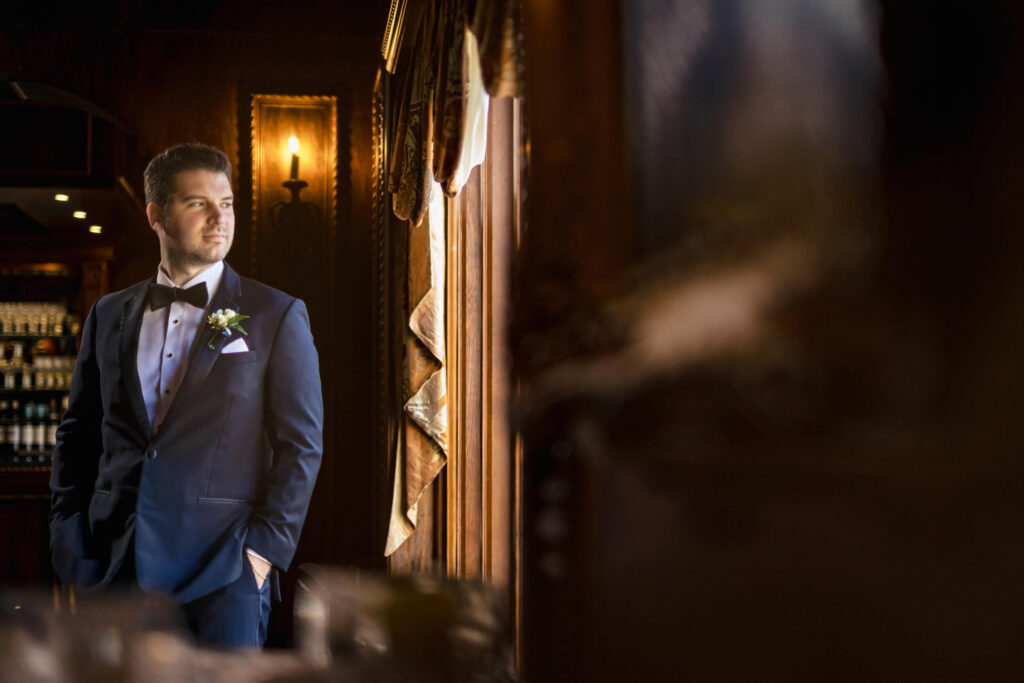 Groom in bar at Nanina's in the Park Wedding