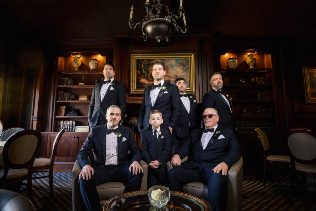 Groom and Groomsmen posing at Nanina's In The Park