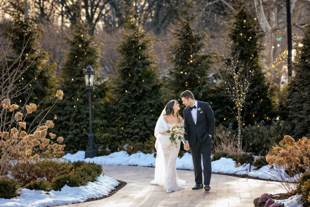 Couple walking down path at Nanina's In The Park