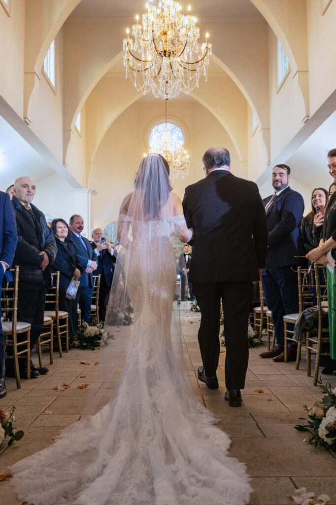 Bride walking down aisle at Nanina's In The Park