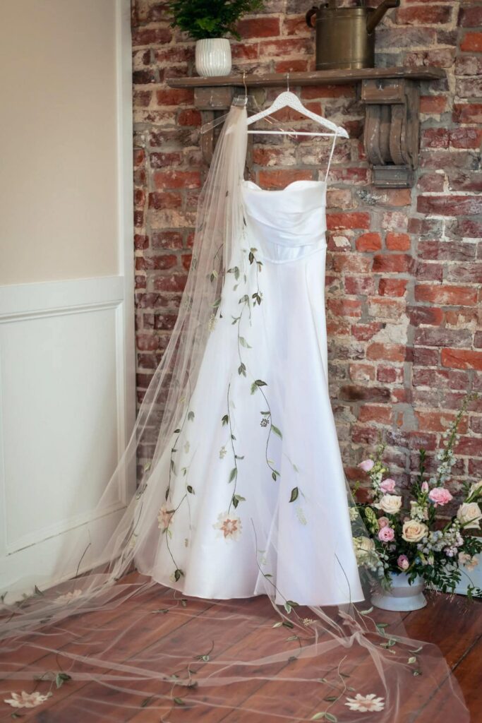 Wedding Dress Hanging at Founders Grove Garden Venue Farmhouse